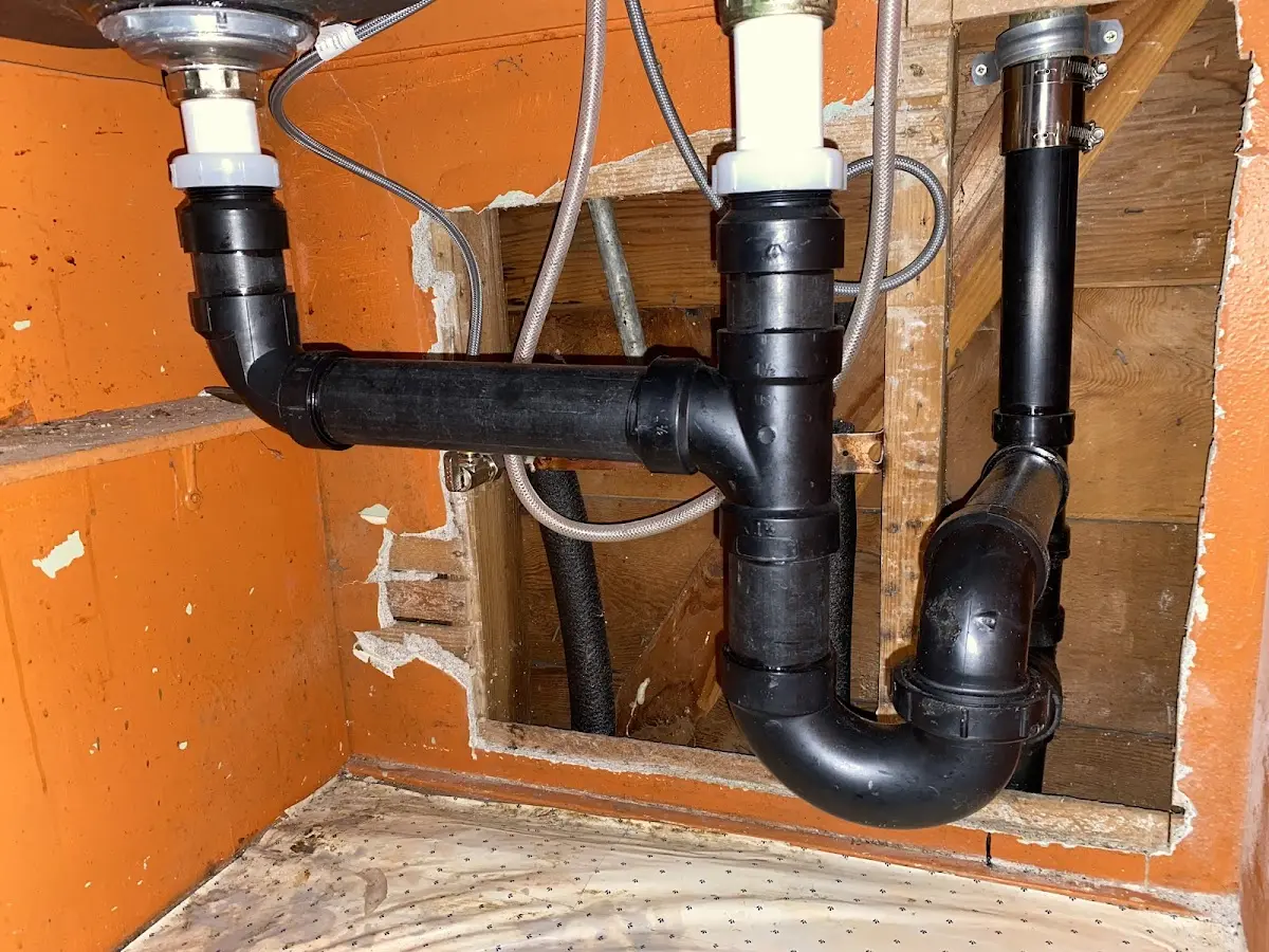 Professional Garbage Disposal Repair equipment and tools on the job in Bel Air South